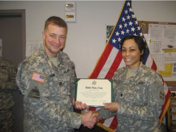 Brandi Benson receiving U.S. Army recognition